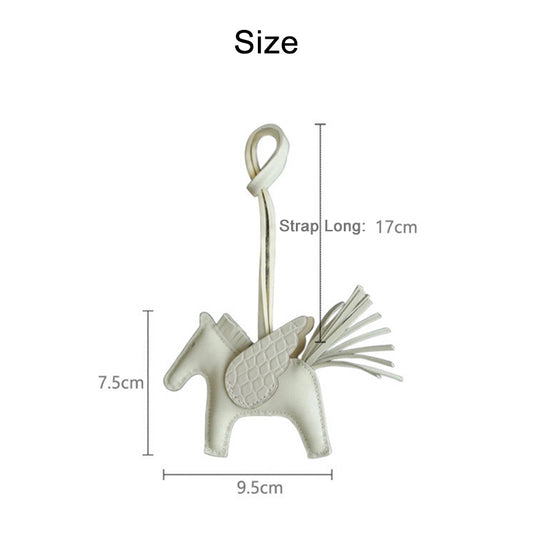 Off-White lambskin Pegasus charm with crocodile pattern wings, including size measurements (9.5cm x 7.5cm).