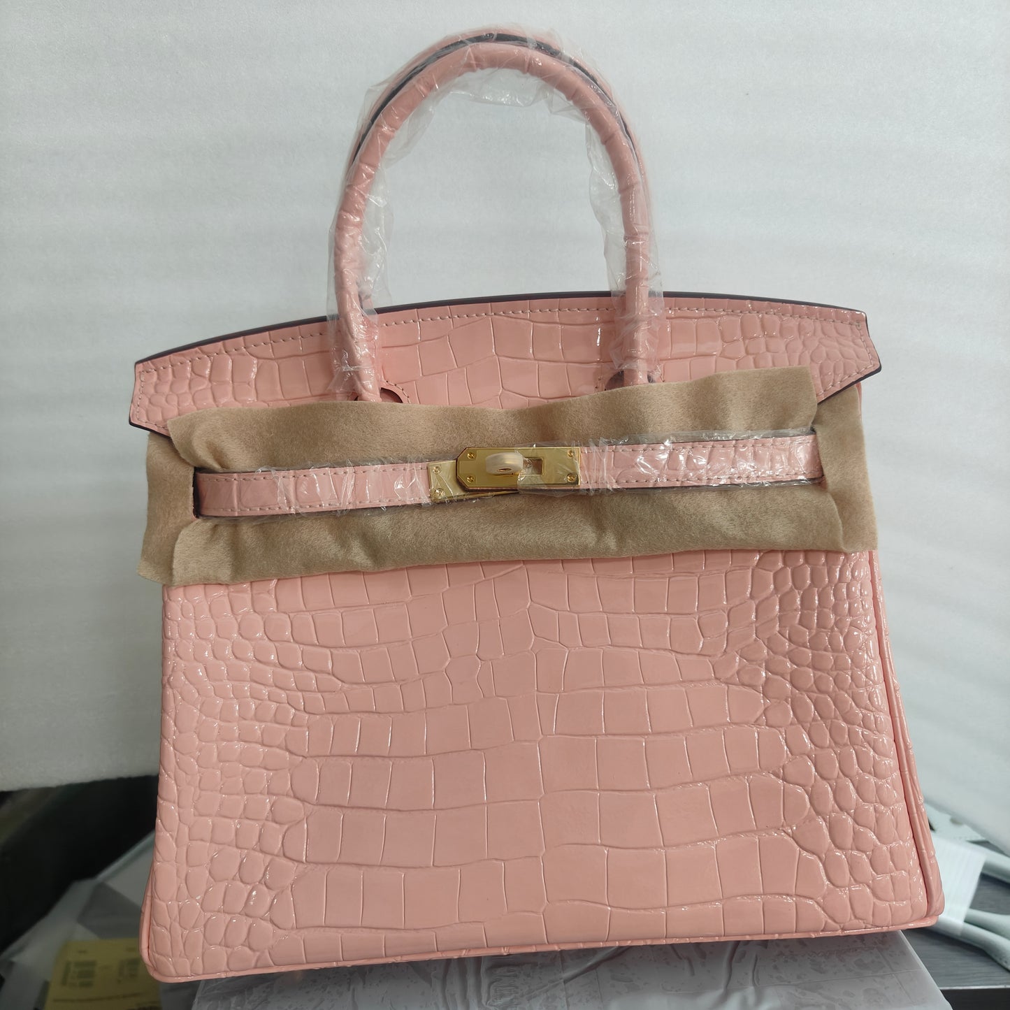 Rose Sakura  berkin handbag with a gold strap