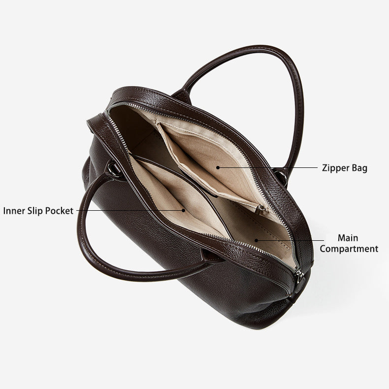 Interior view of leather bowling bag with pockets.