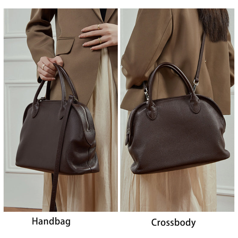 Handbag vs crossbody carry of leather bowling bag.