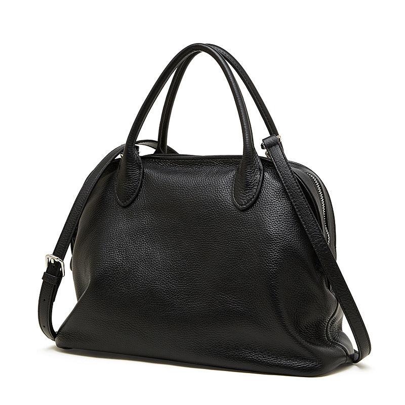 Vintage top grain leather bowling bag in black.