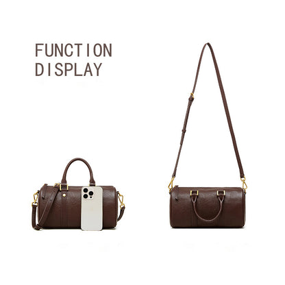 Function display of brown Boston bag showing size reference with a smartphone and 2-way carry options.