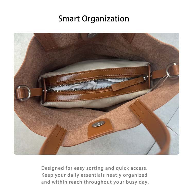 Interior of cowhide leather mini tote bag showing smart organization with a removable zipper inner pouch.