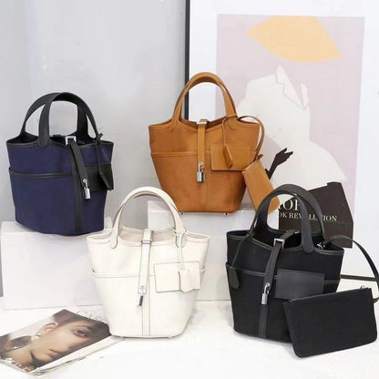 A collection of limited edition Cargo Pictin 18 handbags crafted from leather and canvas, featuring external pockets and silver lock hardware