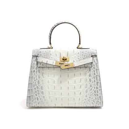 Himalayan White crocodile embossed leather Kelly bag with gold-tone hardware.