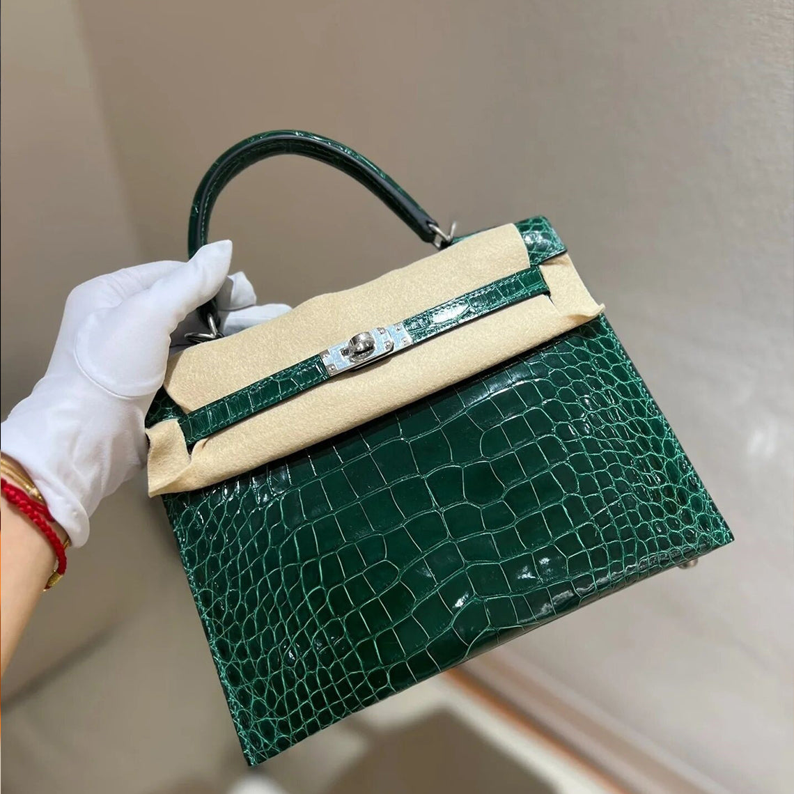 Dark green crocodile embossed leather Kelli bag with silver hardware