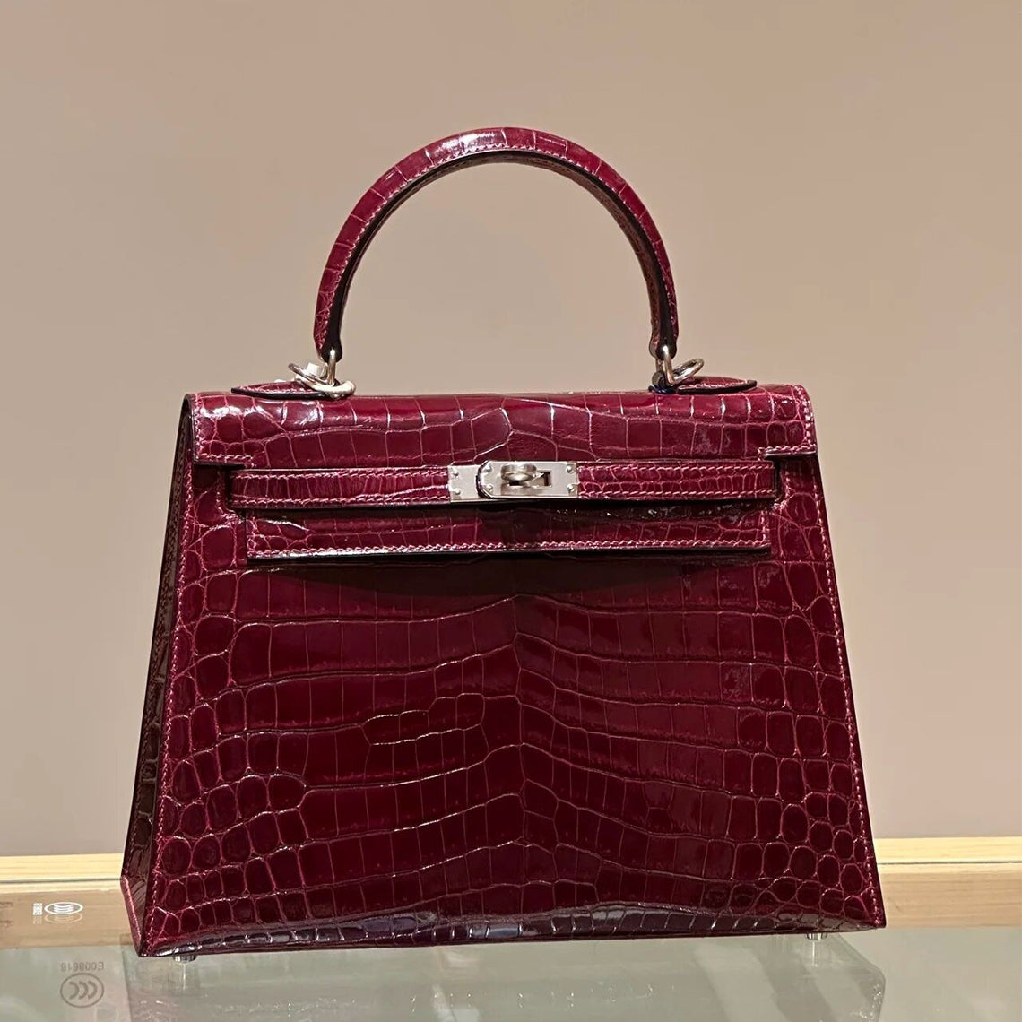 Wine red crocodile embossed leather Kelli bag with silver hardware