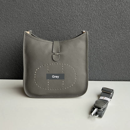 Grey pebbled leather Eveline crossbody bag with silver hardware and a matching detachable strap.