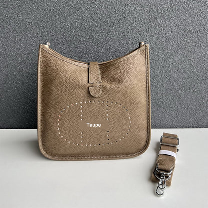 Taupe pebbled leather Eveline crossbody bag with silver hardware and a matching detachable strap.