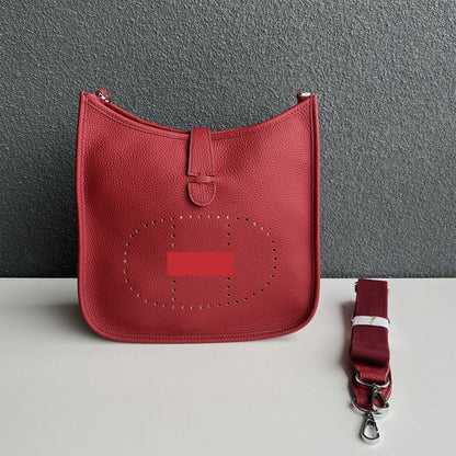 Bordeaux Red pebbled leather Eveline crossbody bag with silver hardware and a matching detachable strap.