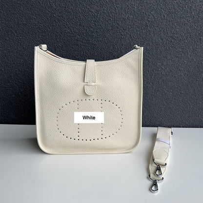 Creamy White pebbled leather Eveline crossbody bag with silver hardware and a matching detachable strap.