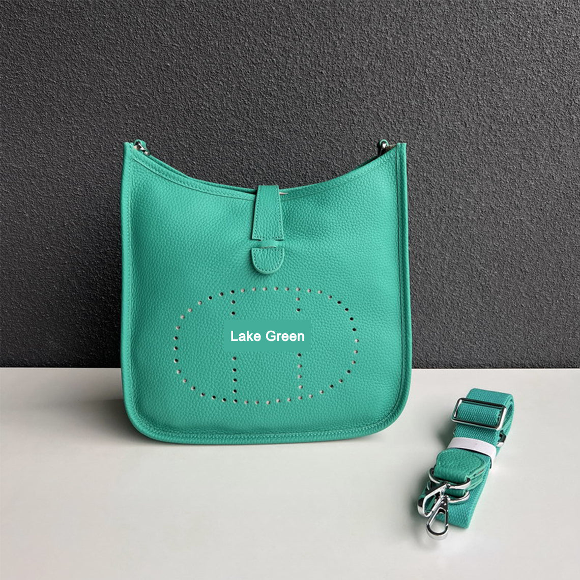 Lake Green pebbled leather Eveline crossbody bag with silver hardware and a matching detachable strap.