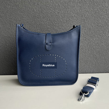 Royalblue pebbled leather Eveline crossbody bag with silver hardware and a matching detachable strap.