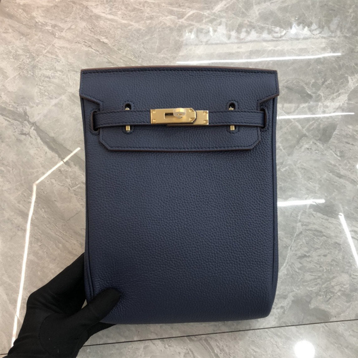 Deep Blue leather designer crossbody bag with silver hardware and a canvas strap.