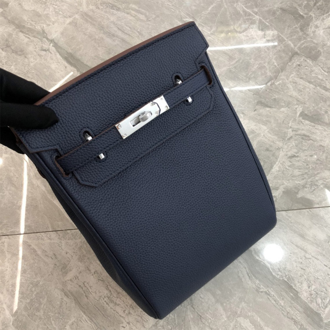 Deep Blue leather designer crossbody bag with silver hardware and a canvas strap.