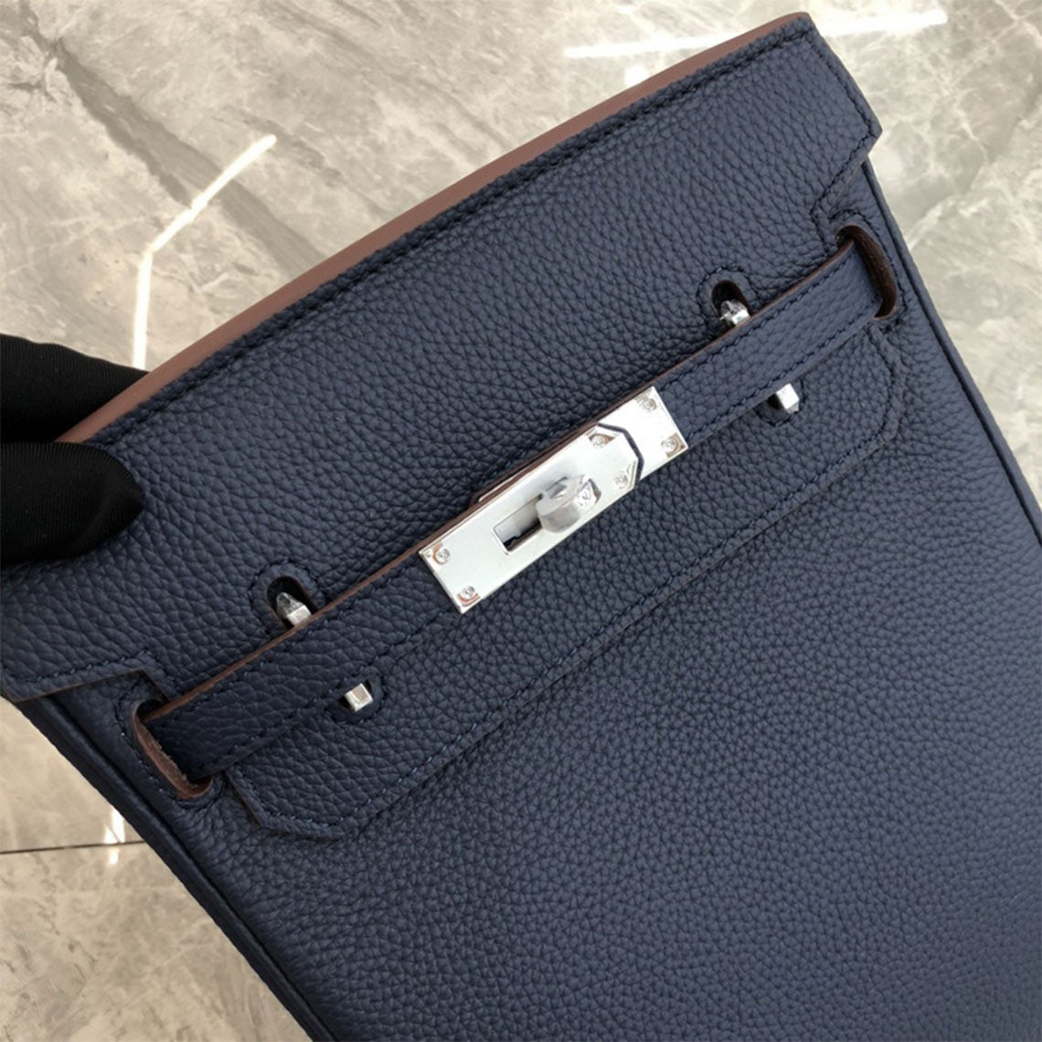 Deep Blue leather designer crossbody bag with silver hardware and a canvas strap.