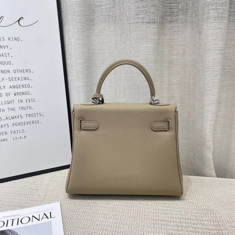 A rear view of the light gray Mini Kelly handbag, exquisitely crafted from premium top-grain leather.