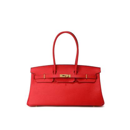 Red handbag with gold hardware