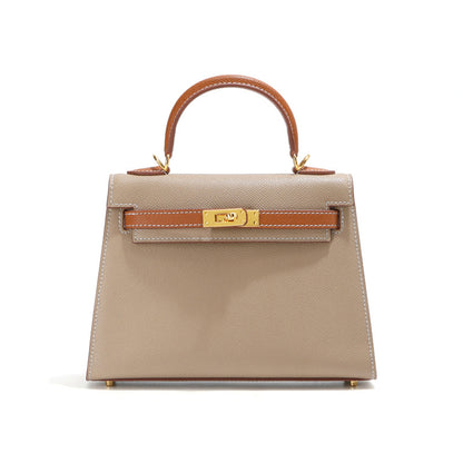 Premium bi-color leather Kelli bag, a timeless and versatile accessory for any outfit.