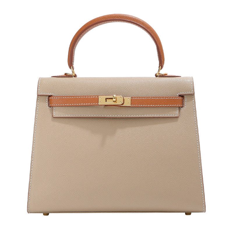  Inspired Kelli bag in a timeless taupe and tan bi-color leather with signature gold-tone hardware.