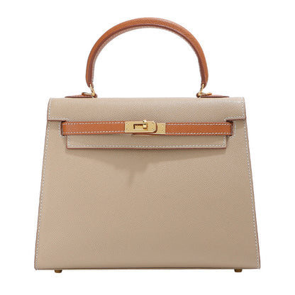  Inspired Kelli bag in a timeless taupe and tan bi-color leather with signature gold-tone hardware.