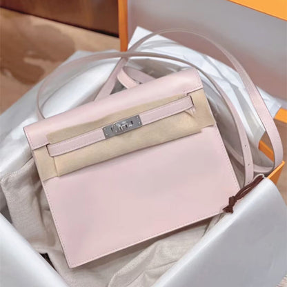 A Sakura Pink top grain leather Kelli Danse bag with silver hardware, presented in its original gift box with a dust bag and protective felt.