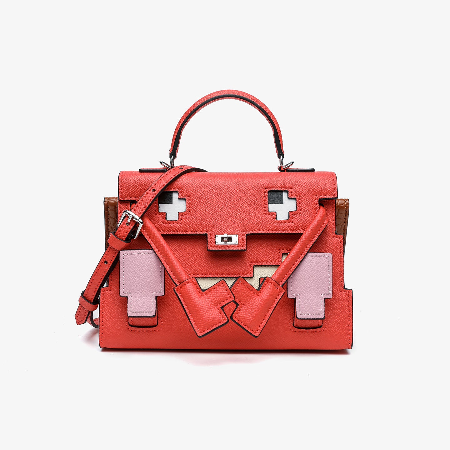 Red Epsom leather Picto Kelly Doll bag with pixelated face design, pink accents, and adjustable shoulder strap.