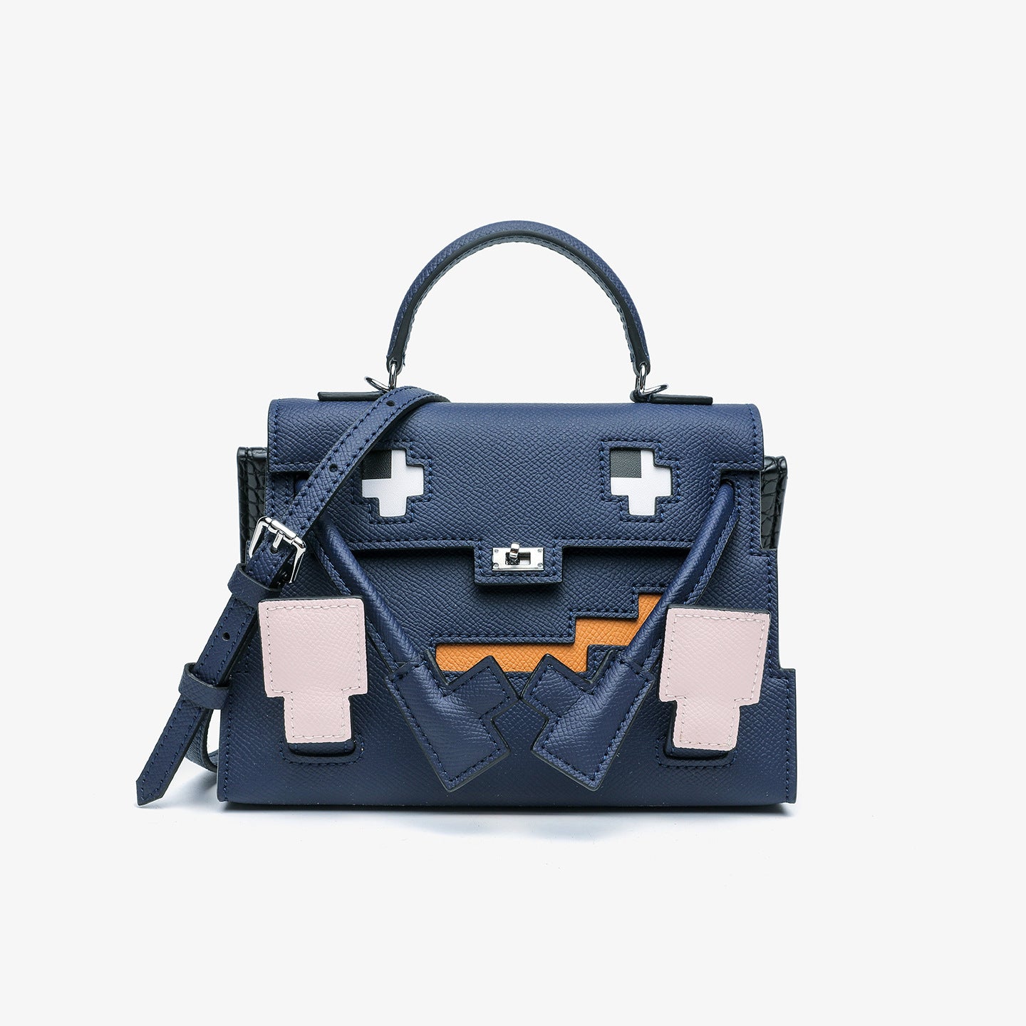 Dark Blue Epsom leather Picto Kelly Doll bag with pixelated face design, tan accents, and a matching shoulder strap.
