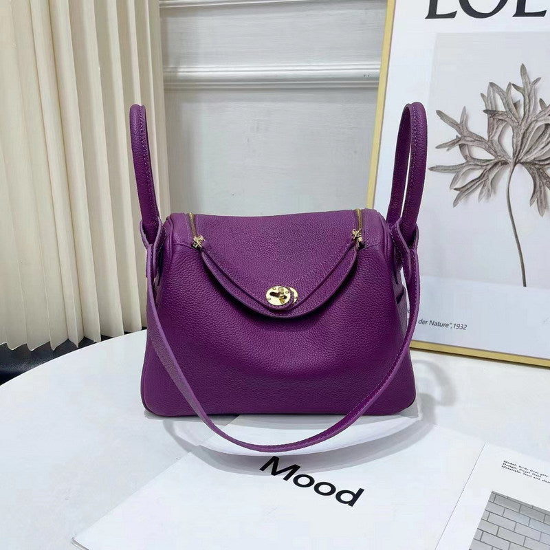 Anemone purple top grain leather Lindy bag with golden hardware