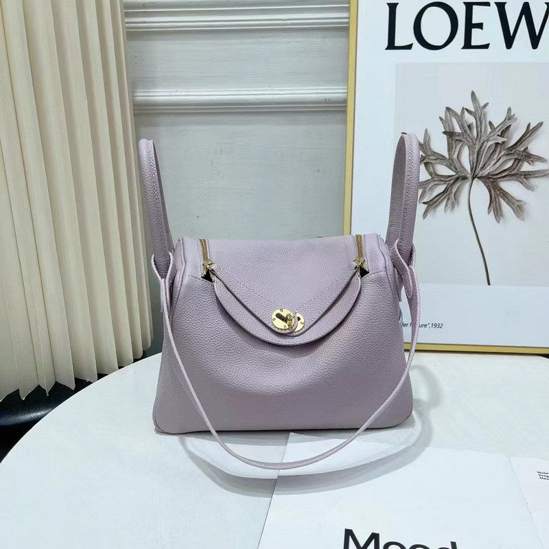 Light purple top grain leather Lindy bag with golden hardware
