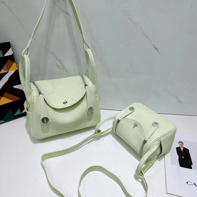 Bubble green top grain leather Lindy bags in two sizes with silver hardware
