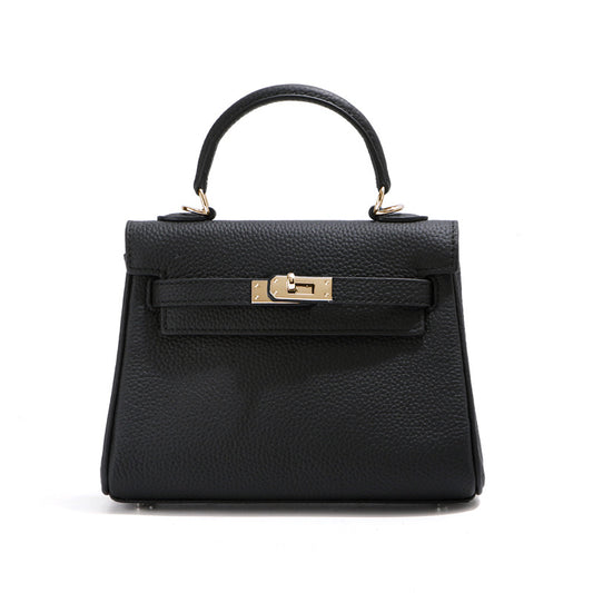 Front view of a black mini Kelli handbag in premium pebbled leather with elegant gold hardware.