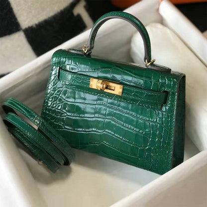 Deep green croc embossed leather mini Kelly bag with gold hardware and top handle, luxury inspired petite handbag.