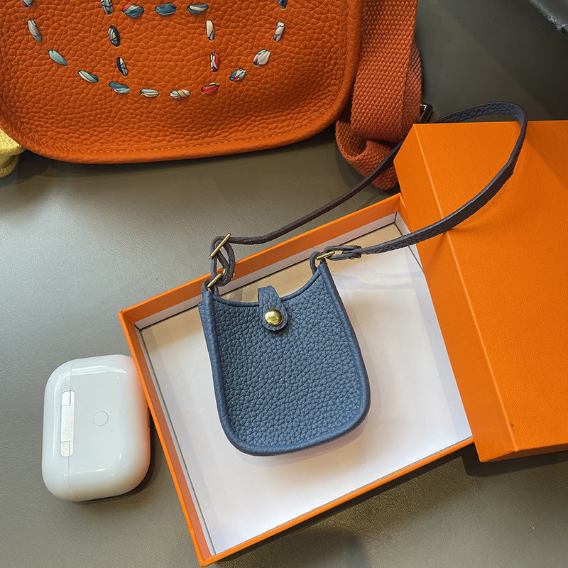Blue Mini Leather Eveline AirPods Pro Case and Luxury Bag Charm.