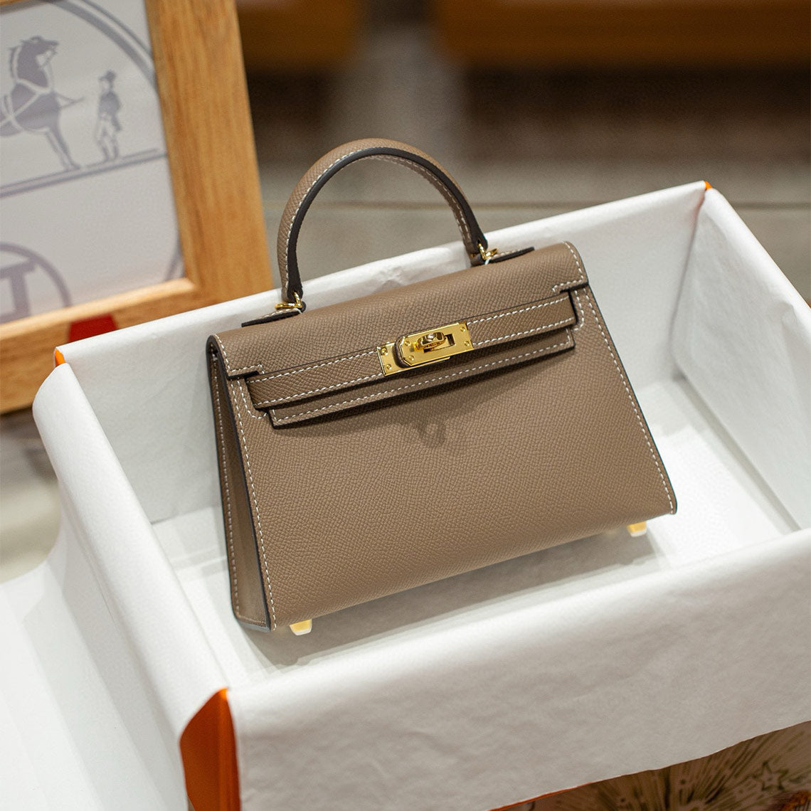 Taupe Leather Mini handbag with gold hardware