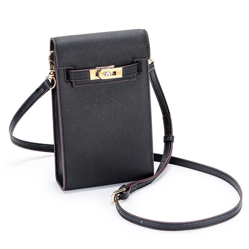 Black genuine leather mini phone bag with gold-tone Kelly lock and long crossbody shoulder strap.
