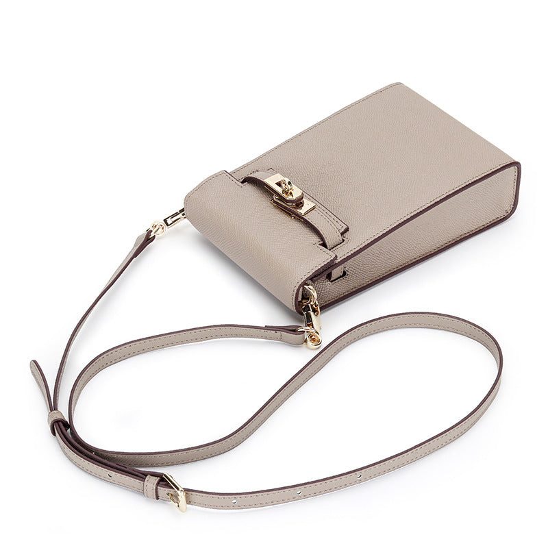 Taupe genuine leather mini phone bag with Kelly-style gold lock and adjustable shoulder strap.
