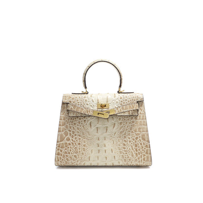 Beige crocodile embossed leather Kelly bag with gold hardware.
