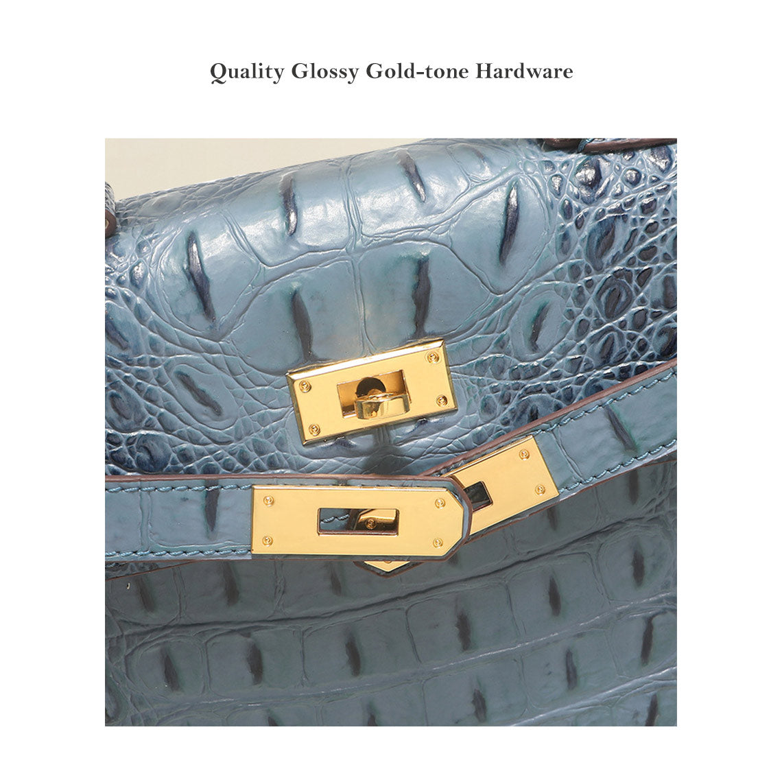 Detail of glossy gold-tone hardware on a blue crocodile embossed leather Kelly bag.