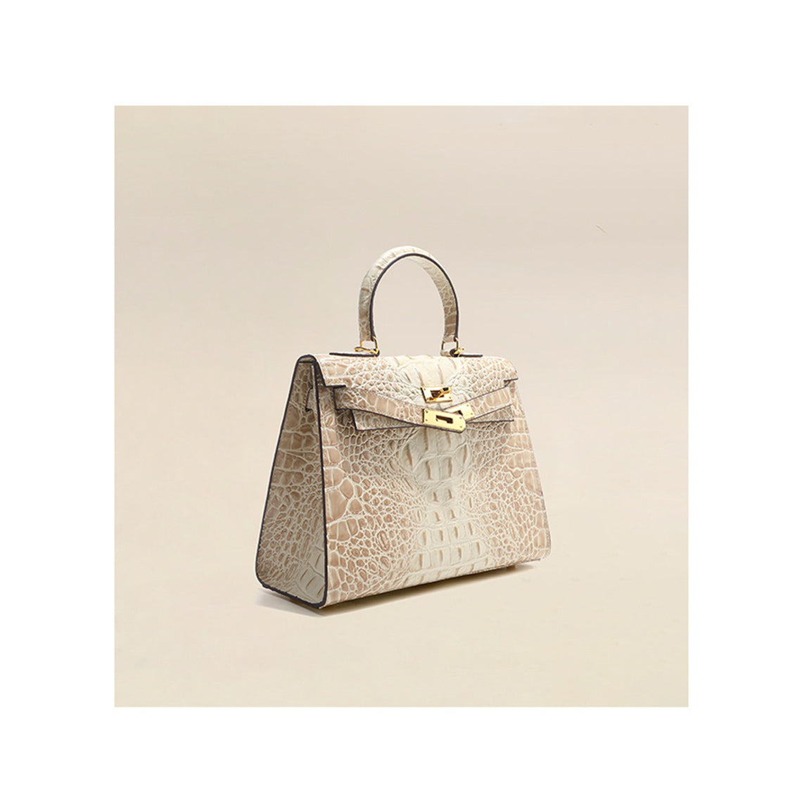 Himalayan White crocodile embossed leather Kelly bag with gold hardware and top handle.